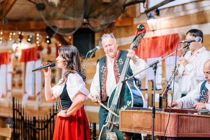 Folk Dinner Experience in Prague with Transportation - What you eat: halusky, meat skewers, and sweet crepes