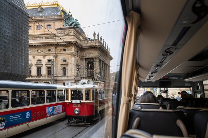Full-Day Prague Tour with Prague Castle, Lunch and Vltava Cruise - Walking the castle courtyards at noon