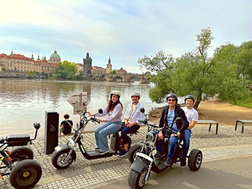 Heart of Prague tour on Tricycle electric scooter - Franz Kafka Museum and the riverbank