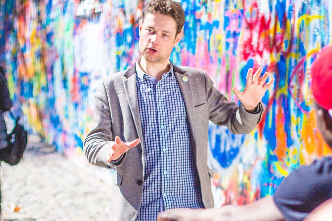 Historical Prague Guided E-Bike Tour - The Lennon Wall and the meaning behind the paint