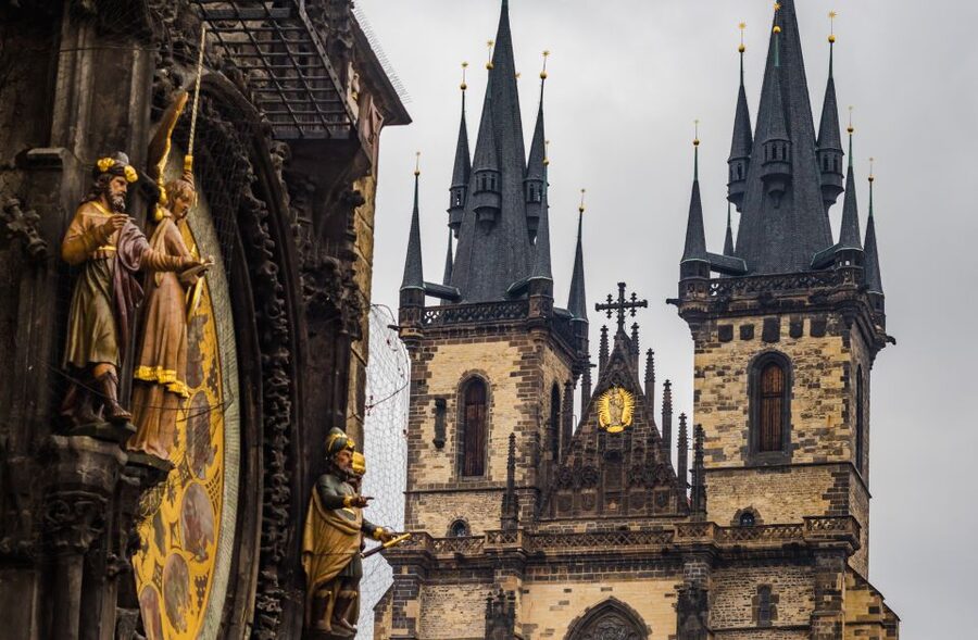 Prague: 3-Hour Walking Tour of Old Town & Prague Castle - Crossing Charles Bridge with stories underfoot