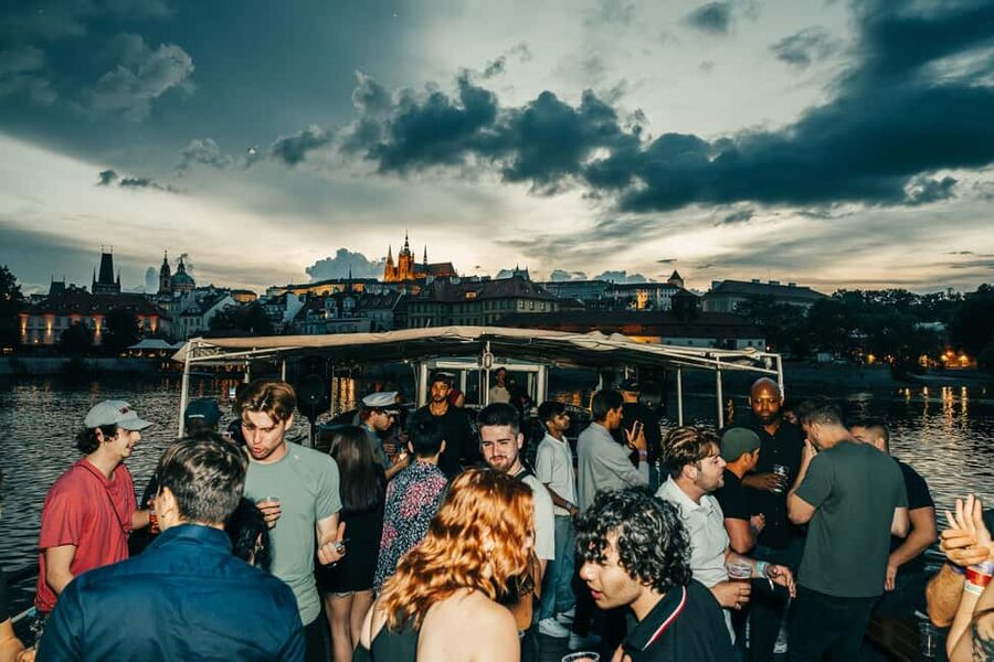 Prague: Booze Cruise with Open Bar and Duplex Entry - Prague seen from the river at sunset