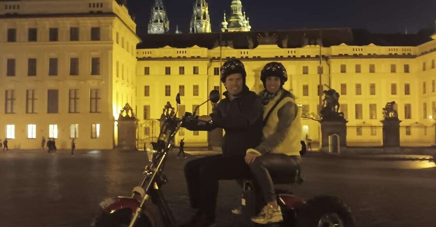 Prague City sightseeing in Night Trike Tour - John Lennon Wall and the Charles Bridge view