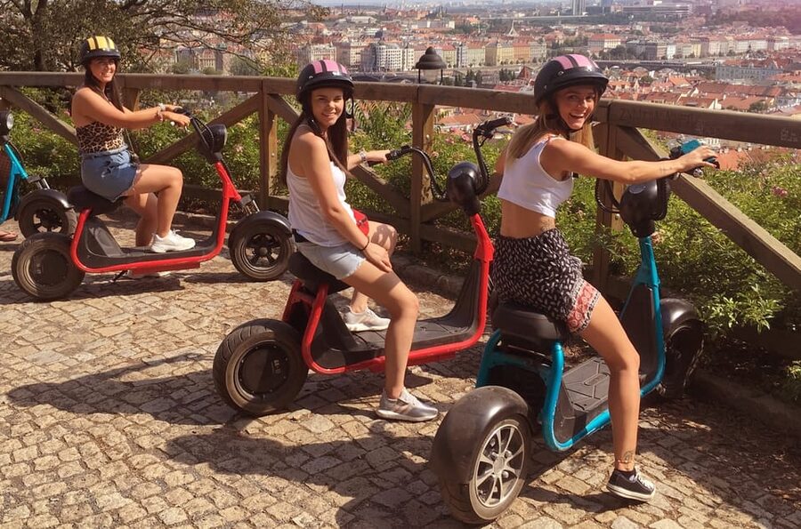 Prague Electric Scooter and eBike Grand Tour - Charles Bridge, the National Theater, and the central sights