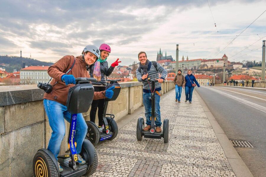 Prague: Grand Segway and eScooter Live Guided City Tour - Reaching Prague Castle by scooter