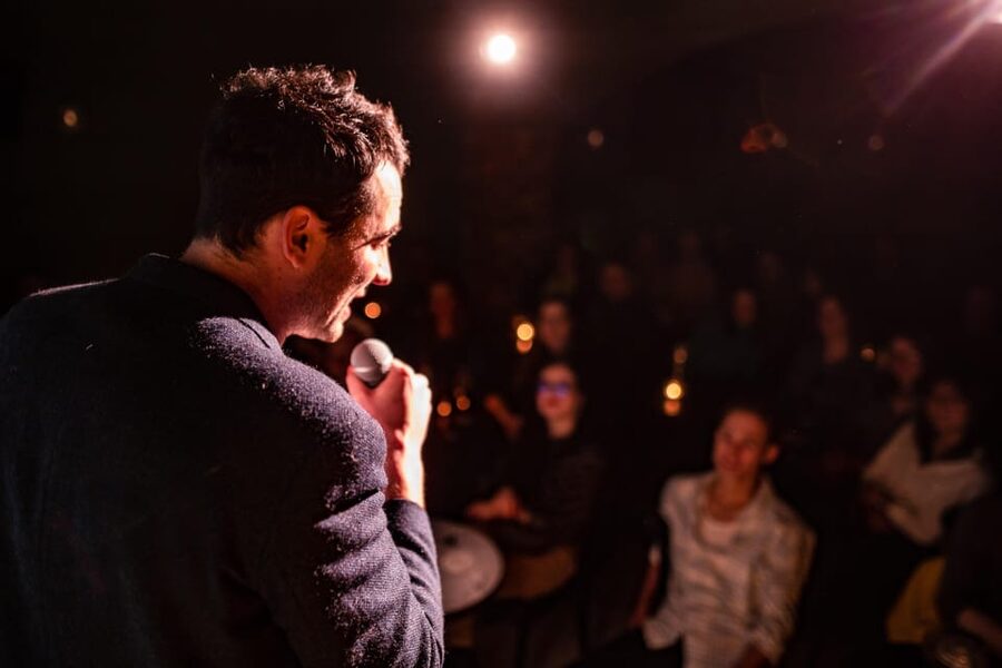 Prague: NYE with Comedy Show, Unlimited Drinks and Fireworks - Arriving at Metro Comedy Club near Charles Bridge