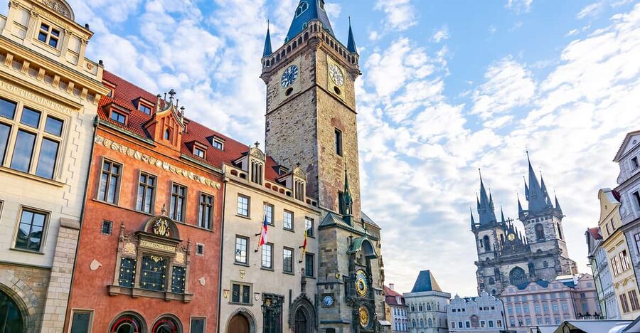 Prague: Old Town Guided Walking Tour and City Boat Ride - Old Town Square’s clock, church, and reformer