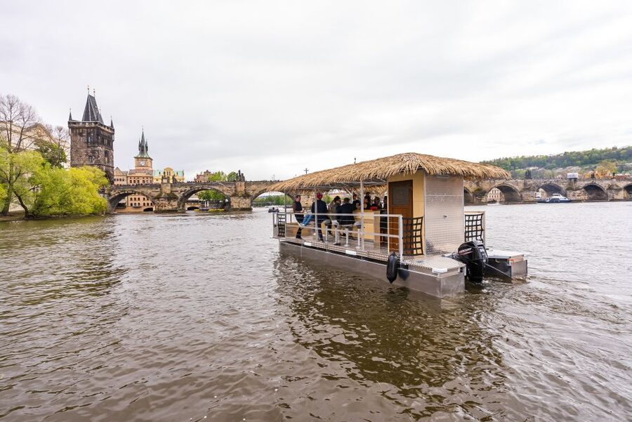 Prague: Party Tiki Boat Sightseeing Cruise with Drinks - Continuing toward Štvanice Island