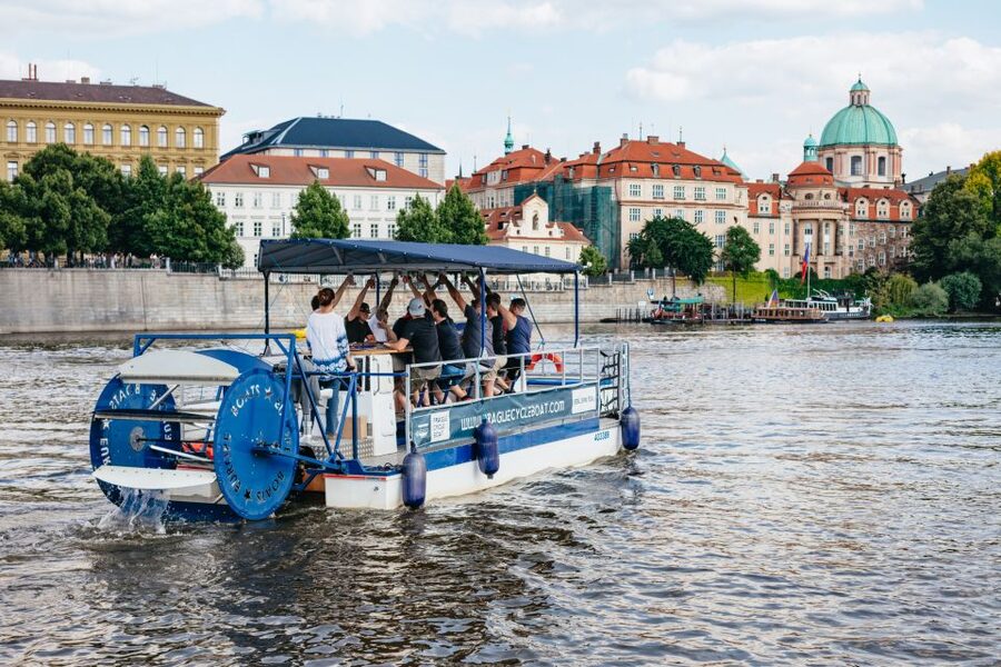 Prague: Swimming Beer Bike on A Cycle Boat - What the guide and captain add to the experience