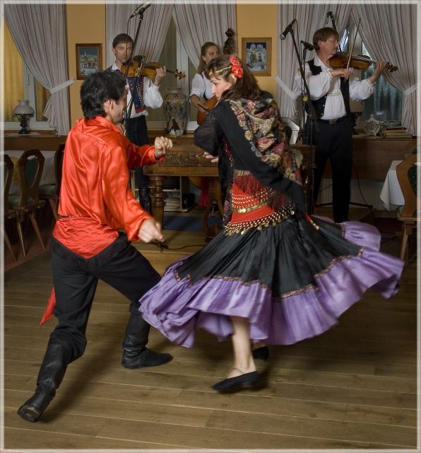 Prague: Traditional Folklore Evening with Dinner & Music - Entering the wine cellar for dinner