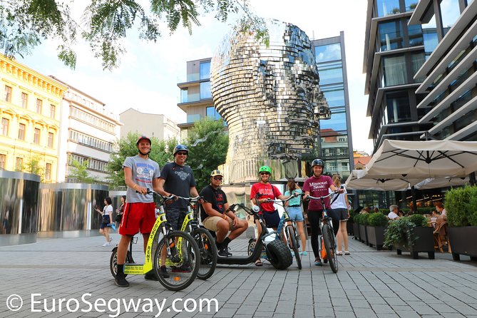 Prague Trike & e-Scooter Tour: Castle Viewpoints & Charles Bridge - Strahov, beer, and Petřín