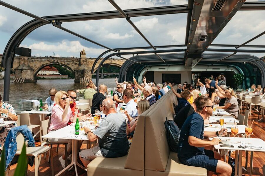 Prague: Vltava River Lunch Cruise in an Open-Top Glass Boat - Live accordion music and the mood onboard