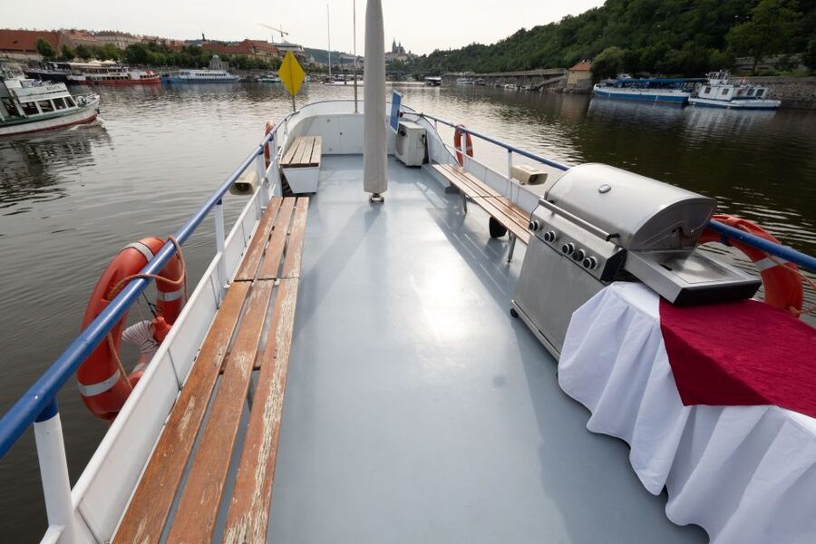 Prague: Vltava River Private Boat Party with Drinks - The National Theatre and Lesser Town riverbank