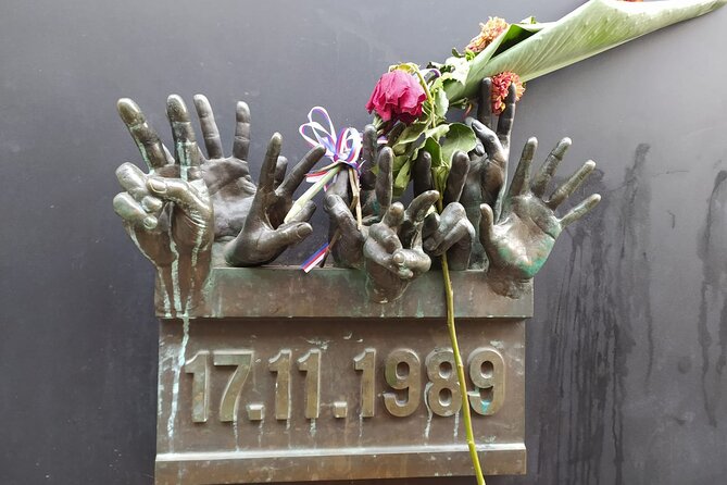 Wars and Totality History tour in Prague - Národní třída and the hands on the wall