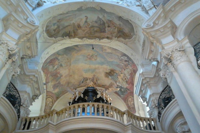 Your own guide for Old Town Highlights and Secrets Tour - Klementinum: scale after the narrow streets